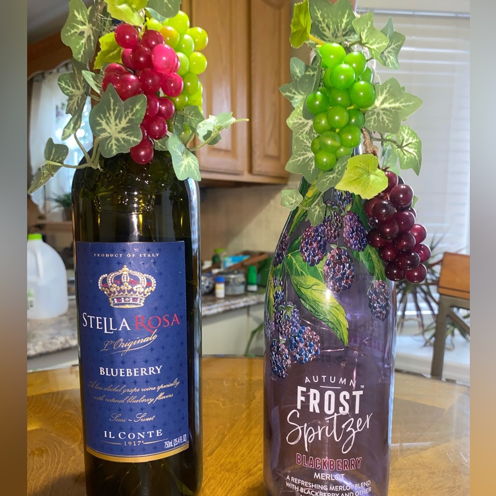 Lighted decorated wine bottles. Bottles may vary different labels .